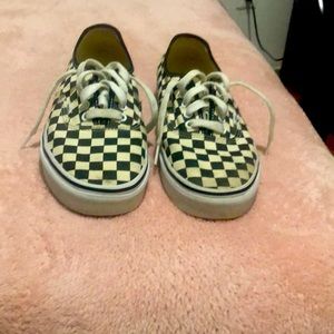 Checker Vans uses but clean in good condition